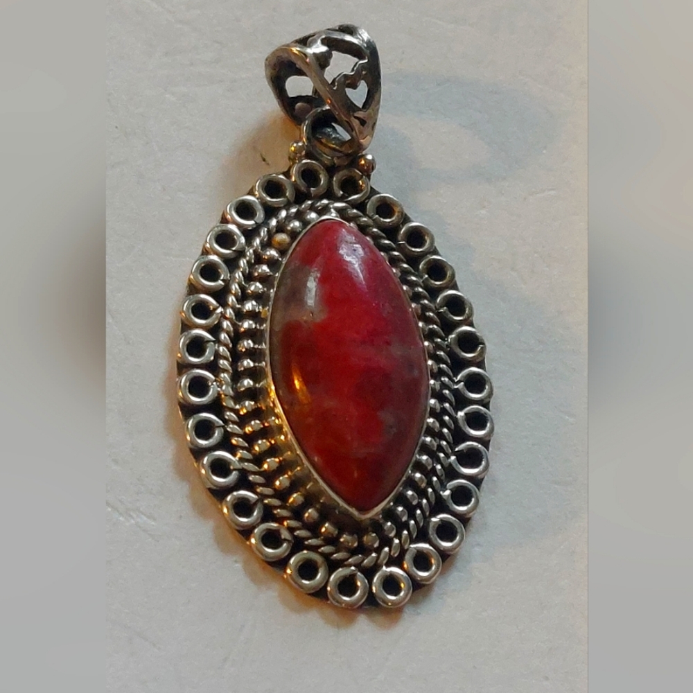 Sterling silver rhodochrosite pendsnt no chain